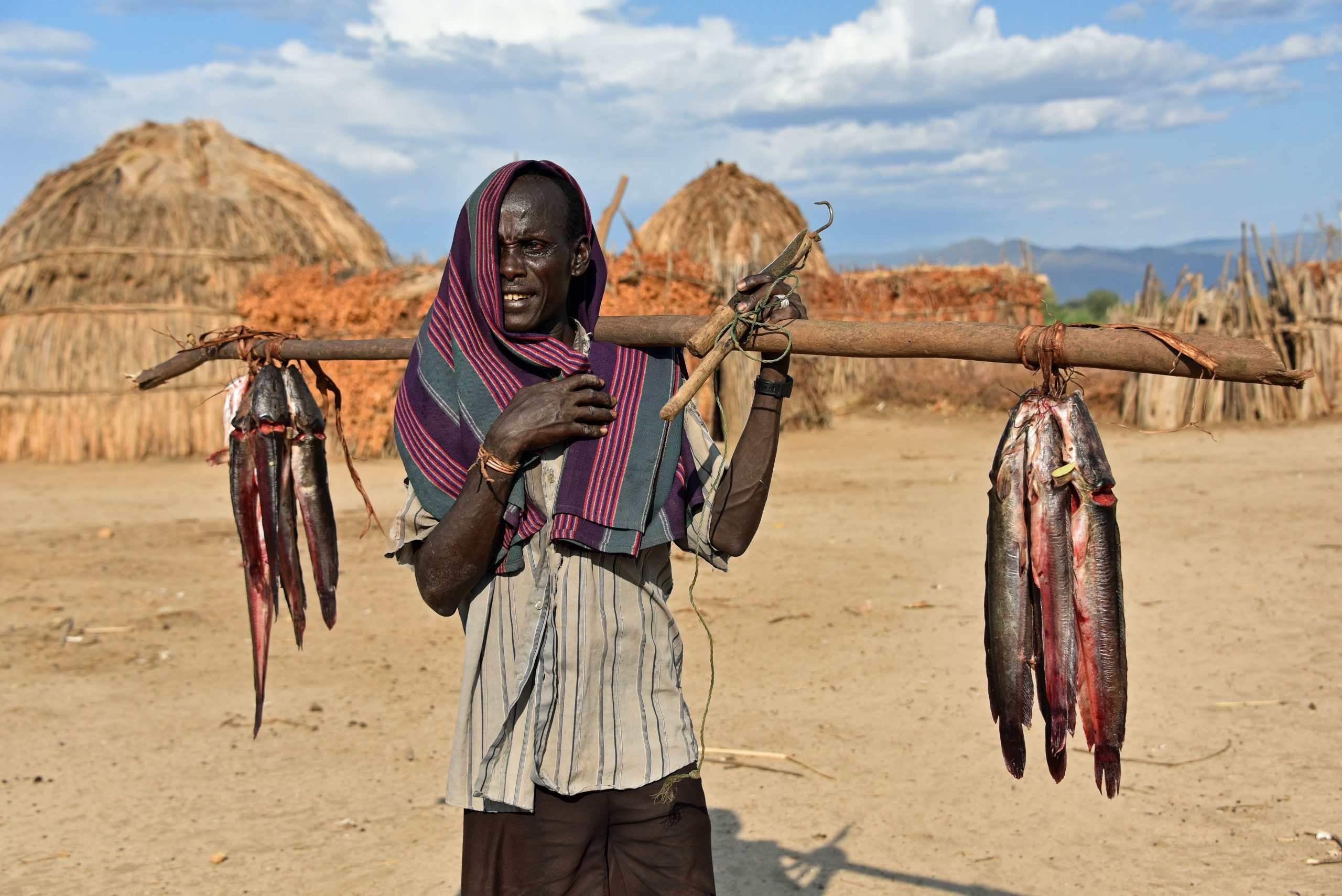 Southern Ethiopia, Arbore man with his catch of the day1